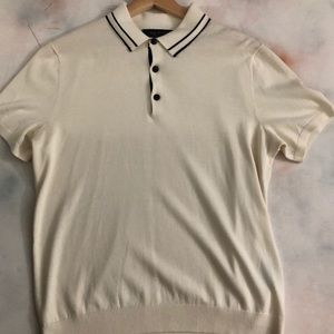 Beige polo with blue striped collar